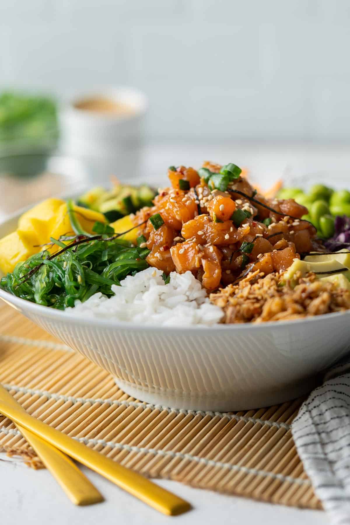 Easy spicy salmon poke bowl view from front.