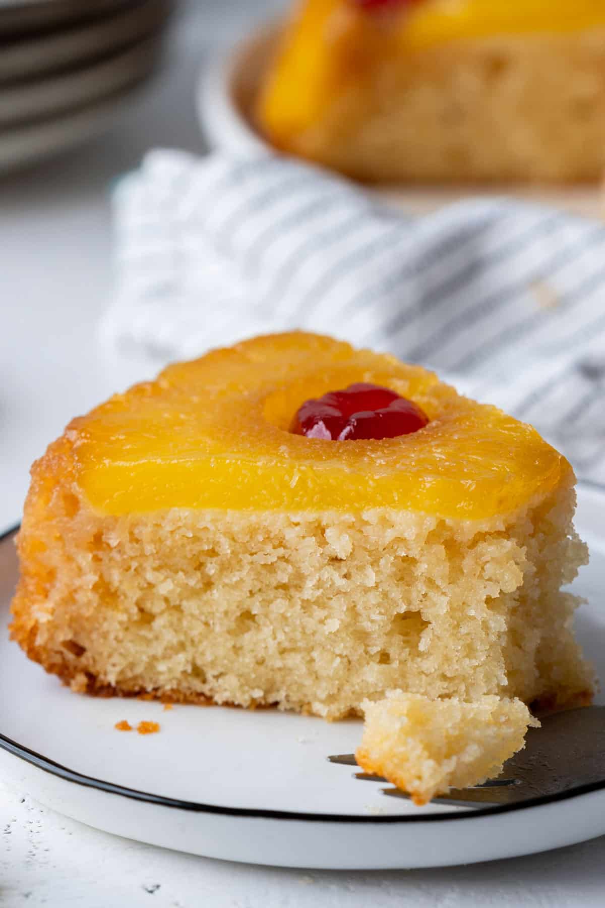 Showing texture of a slice of healthy pineapple upside down cake.