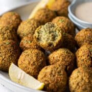 Showing the inside texture of half-eaten air-fryer falafel.