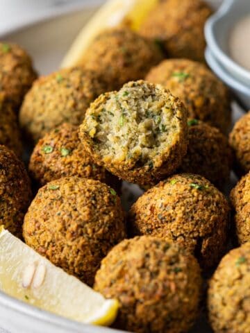 Showing the inside texture of half-eaten air-fryer falafel.