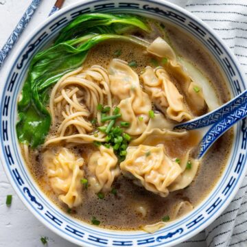 Wonton noodle soup in a bowl view from up