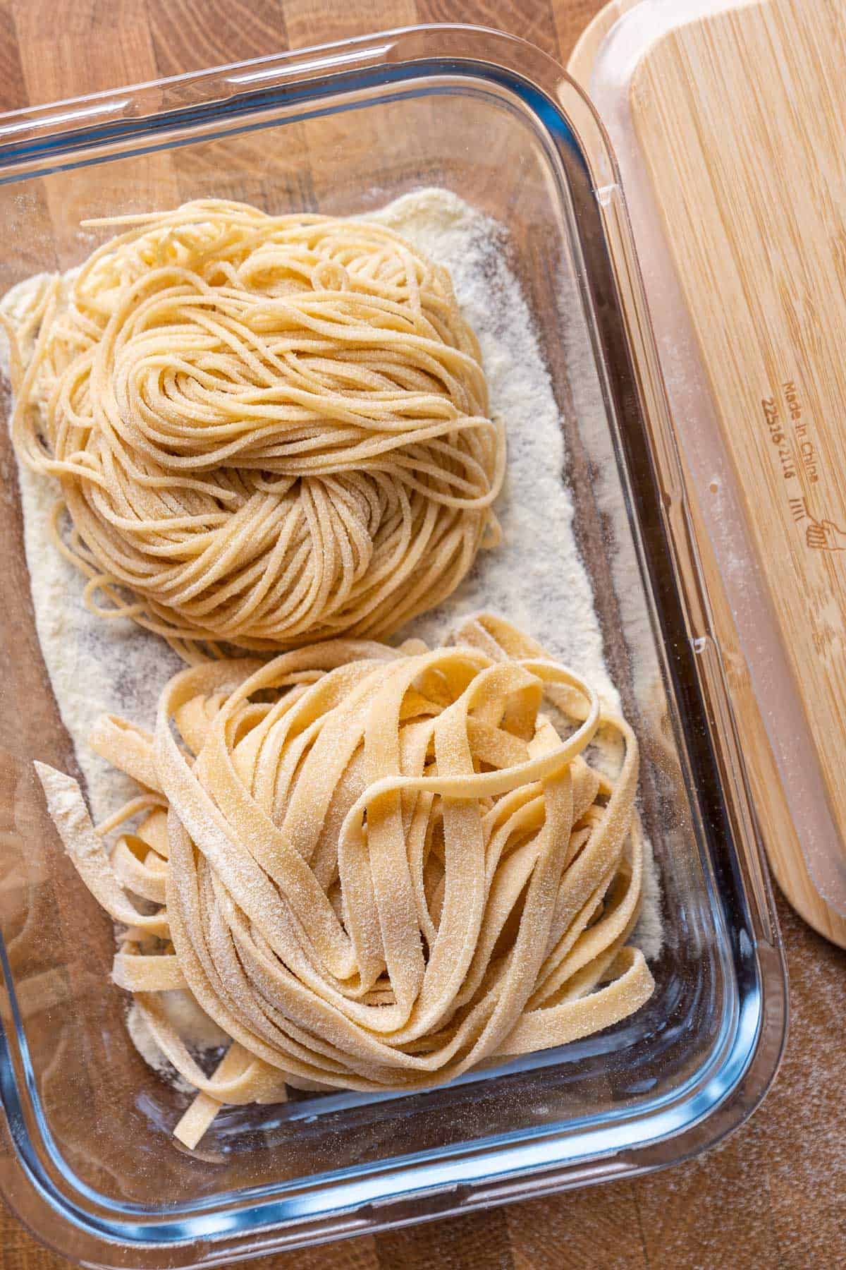 Storing egg noodles in a container.