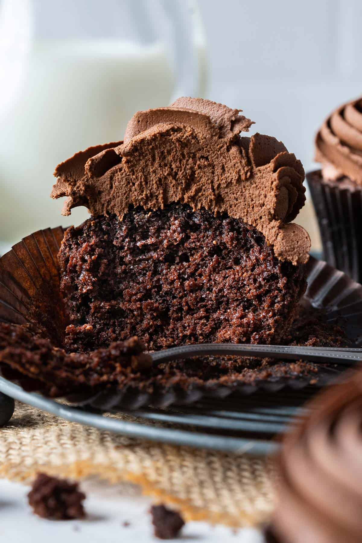 Half eaten healthy chocolate cupcake.