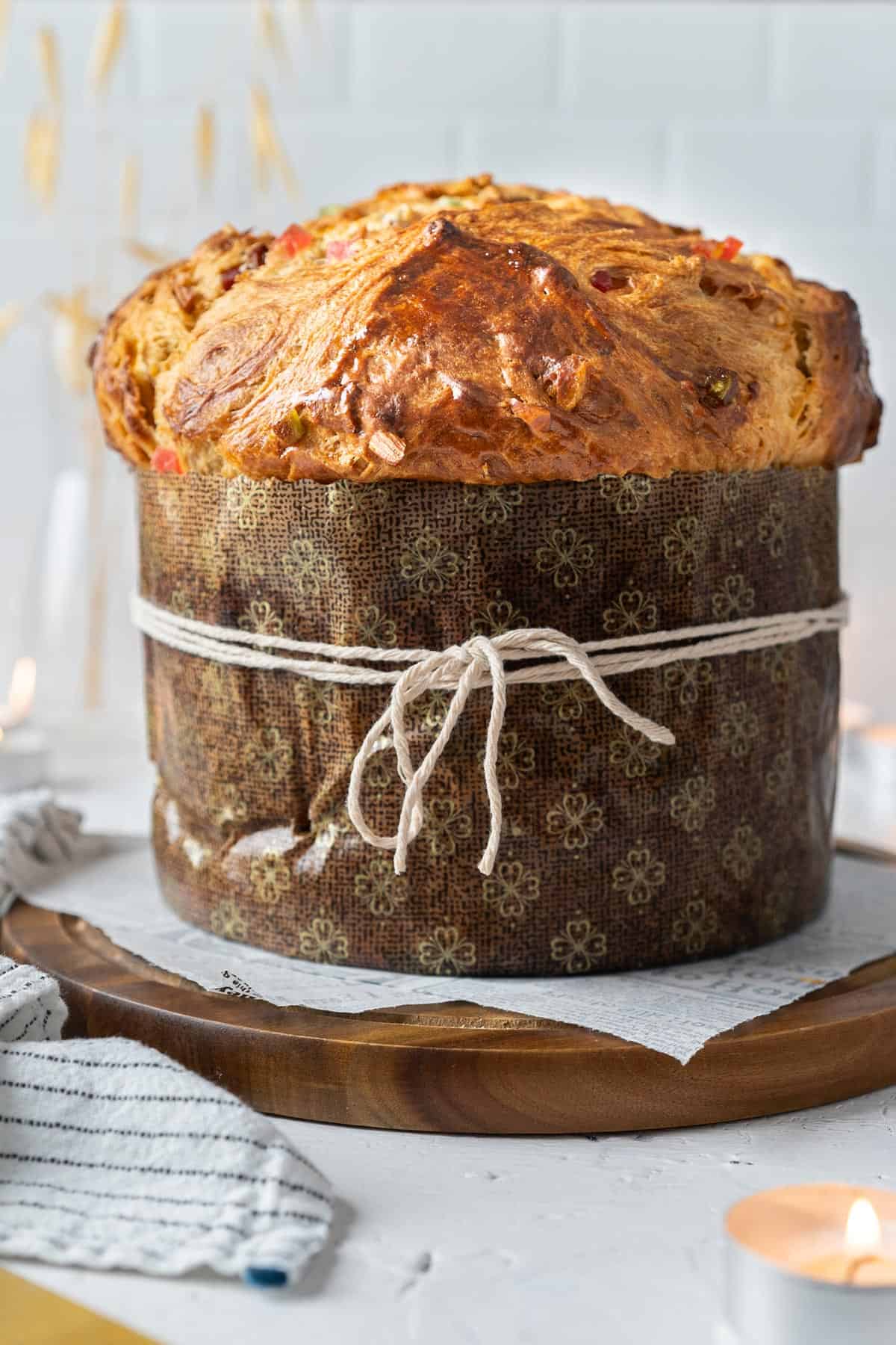 Panettone on a wooden plate.