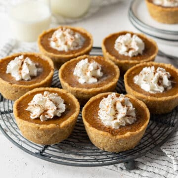 RC Healthy mini pumpkin pies on a cooling rack.