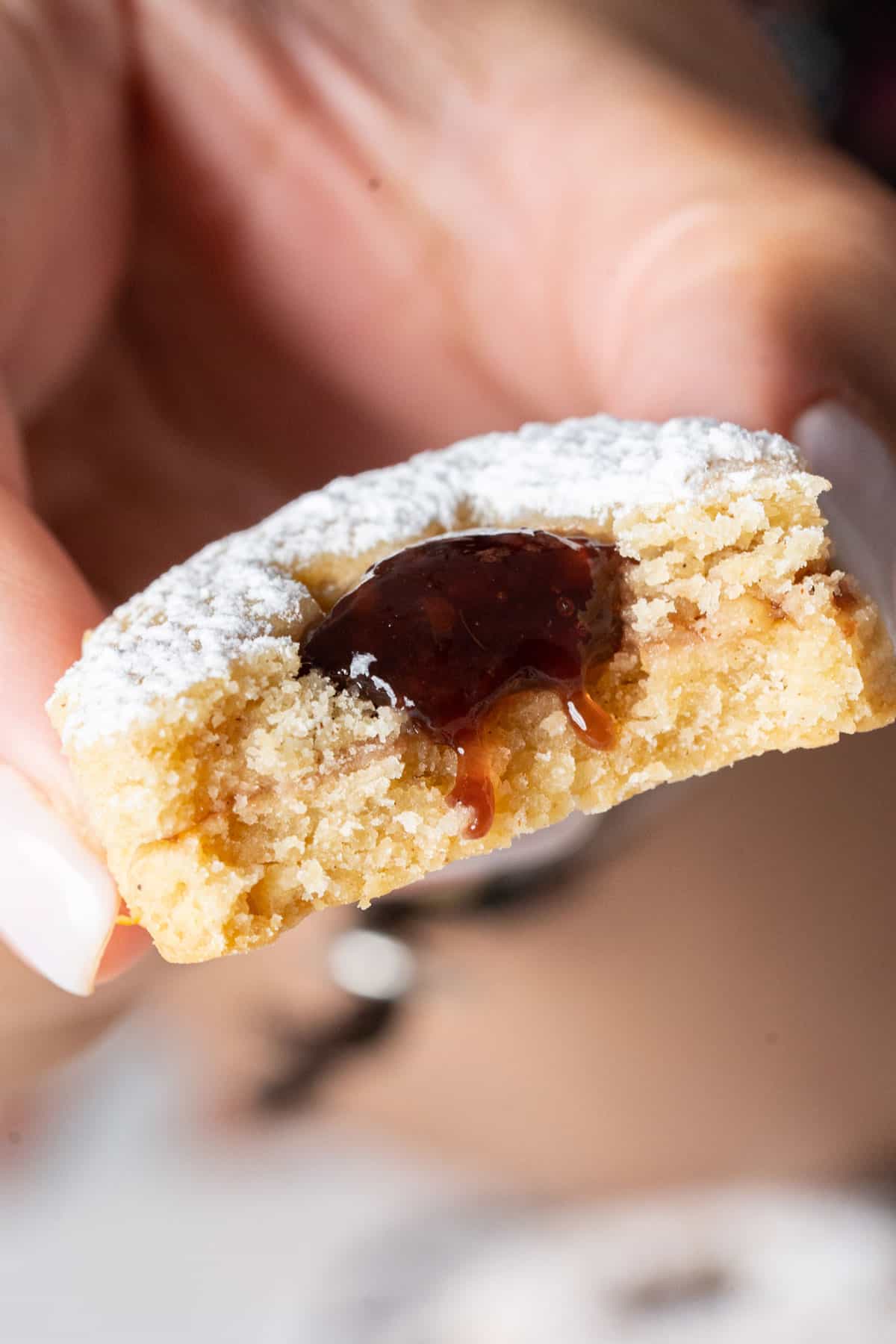 Half eaten healthy Linzer cookie.