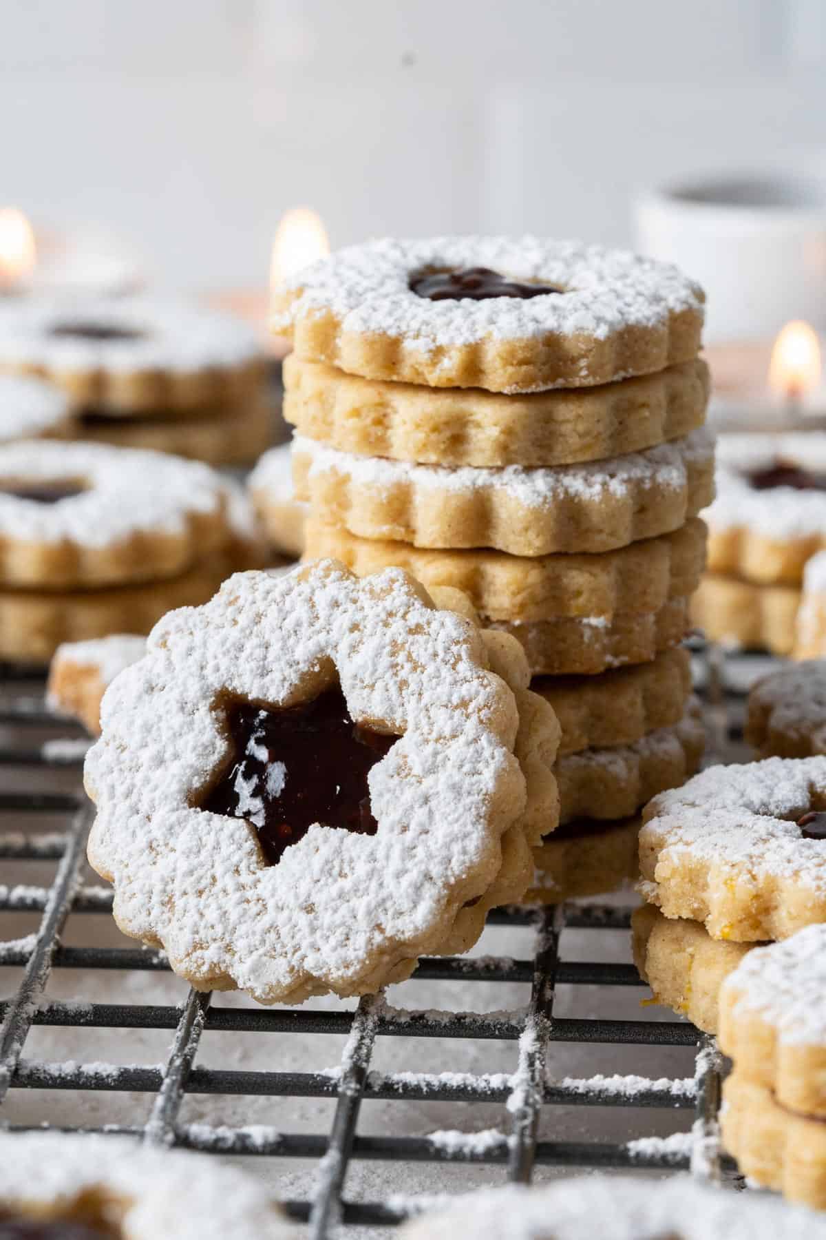 Stacked healthy Linzer cookies.