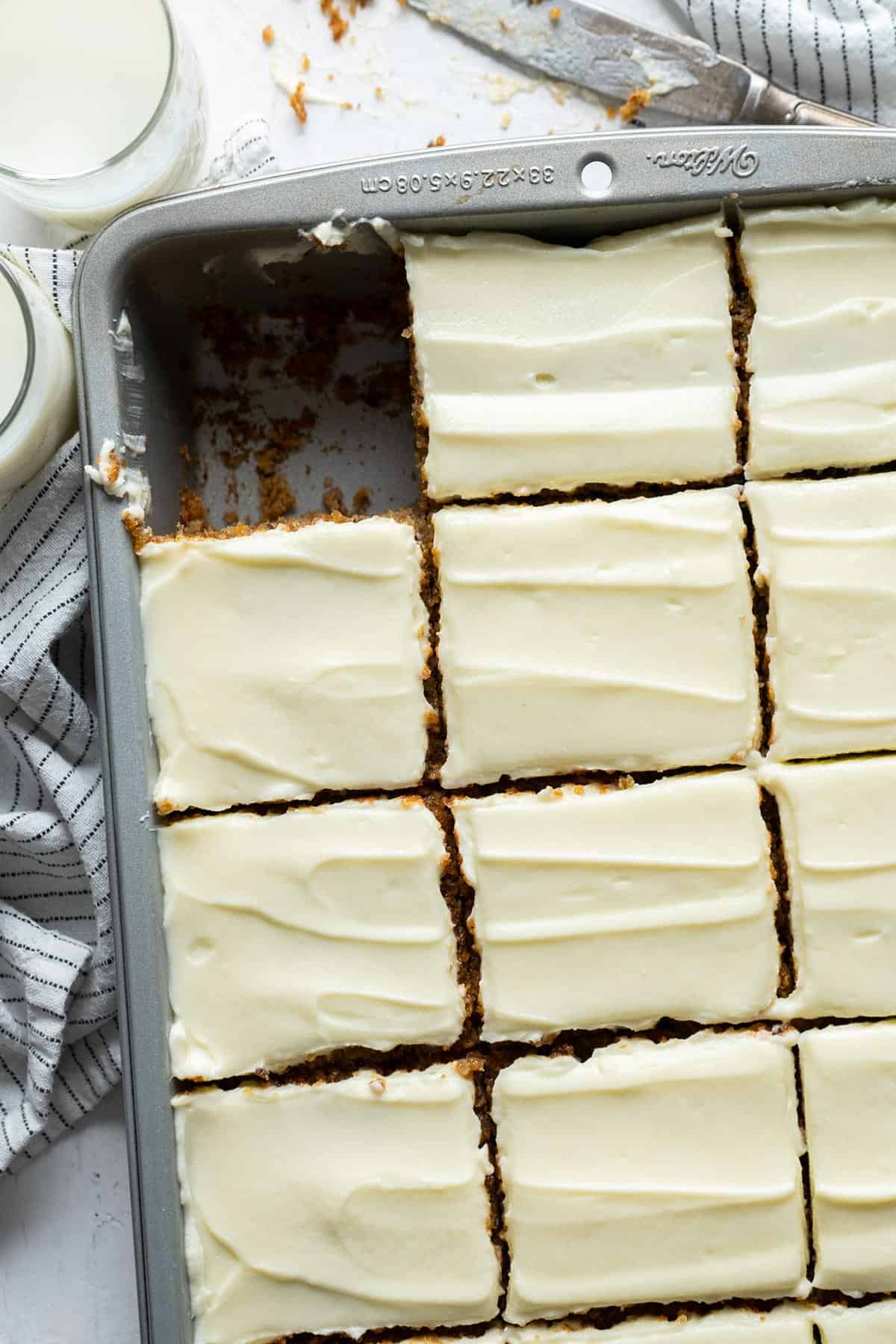 Sliced cake portions in the baking pan.