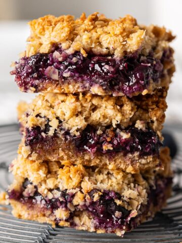 Three blueberry bars stacked.