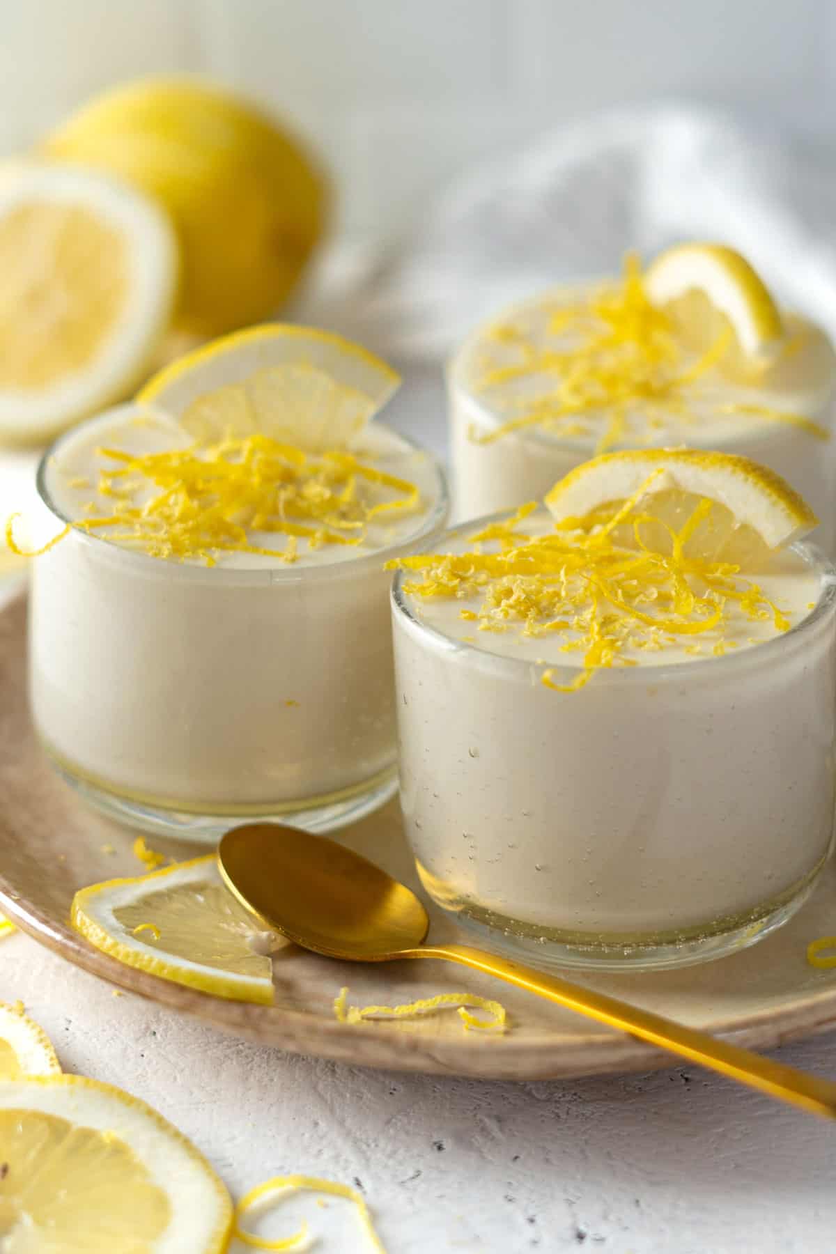 Lemon mousse in small glasses.