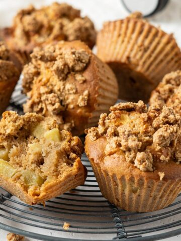 Healthy apple muffins on a rack.