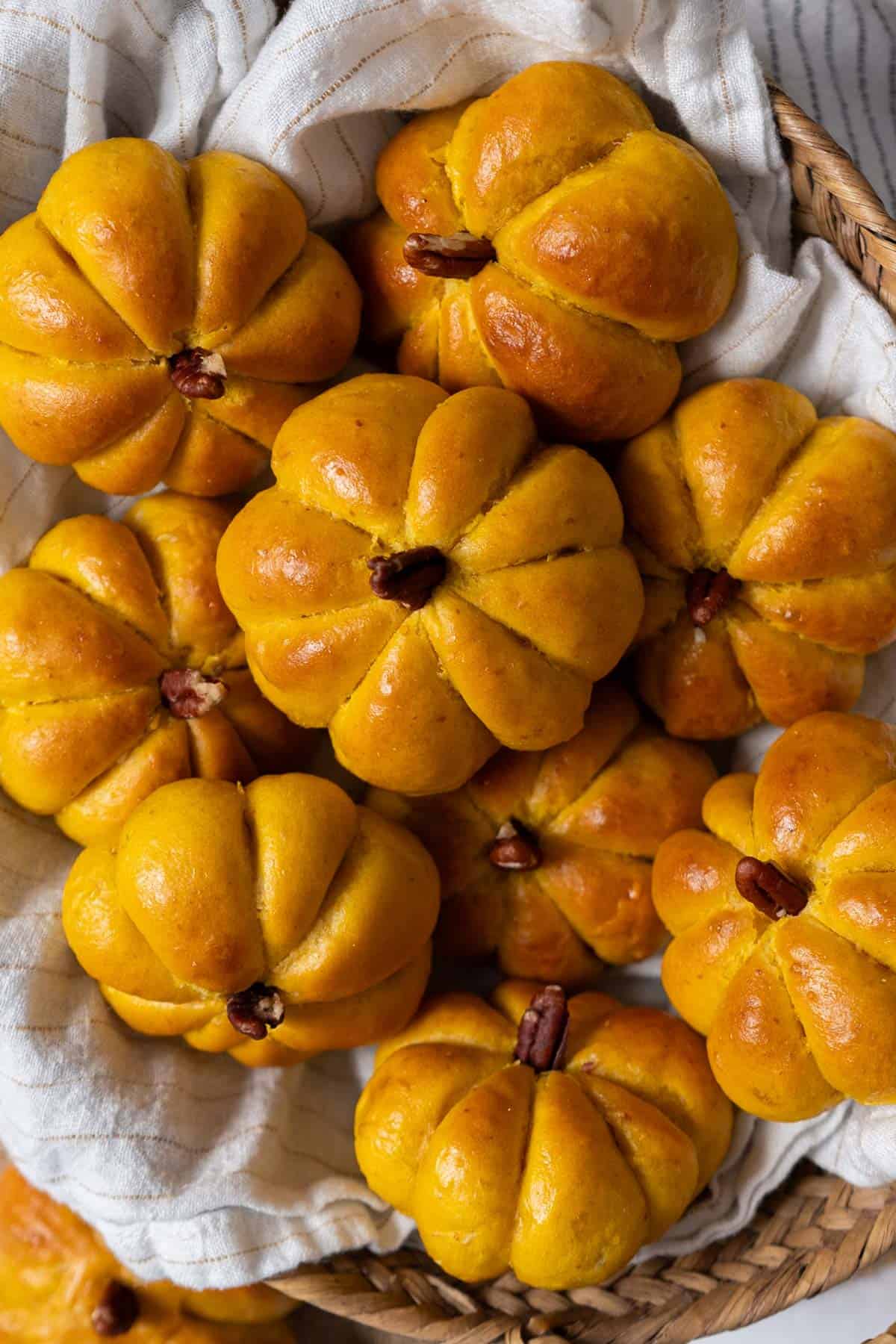 Pumpkin-shaped dinner rolls.