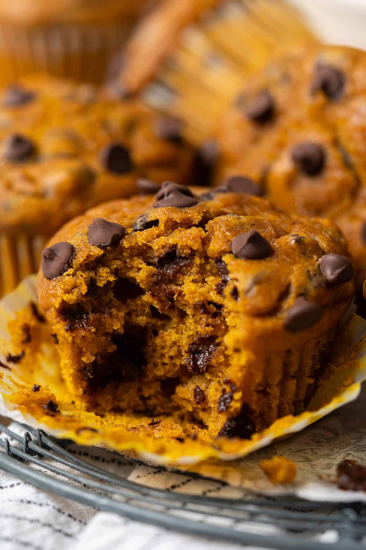 Showing the inside texture of a pumpkin muffin.