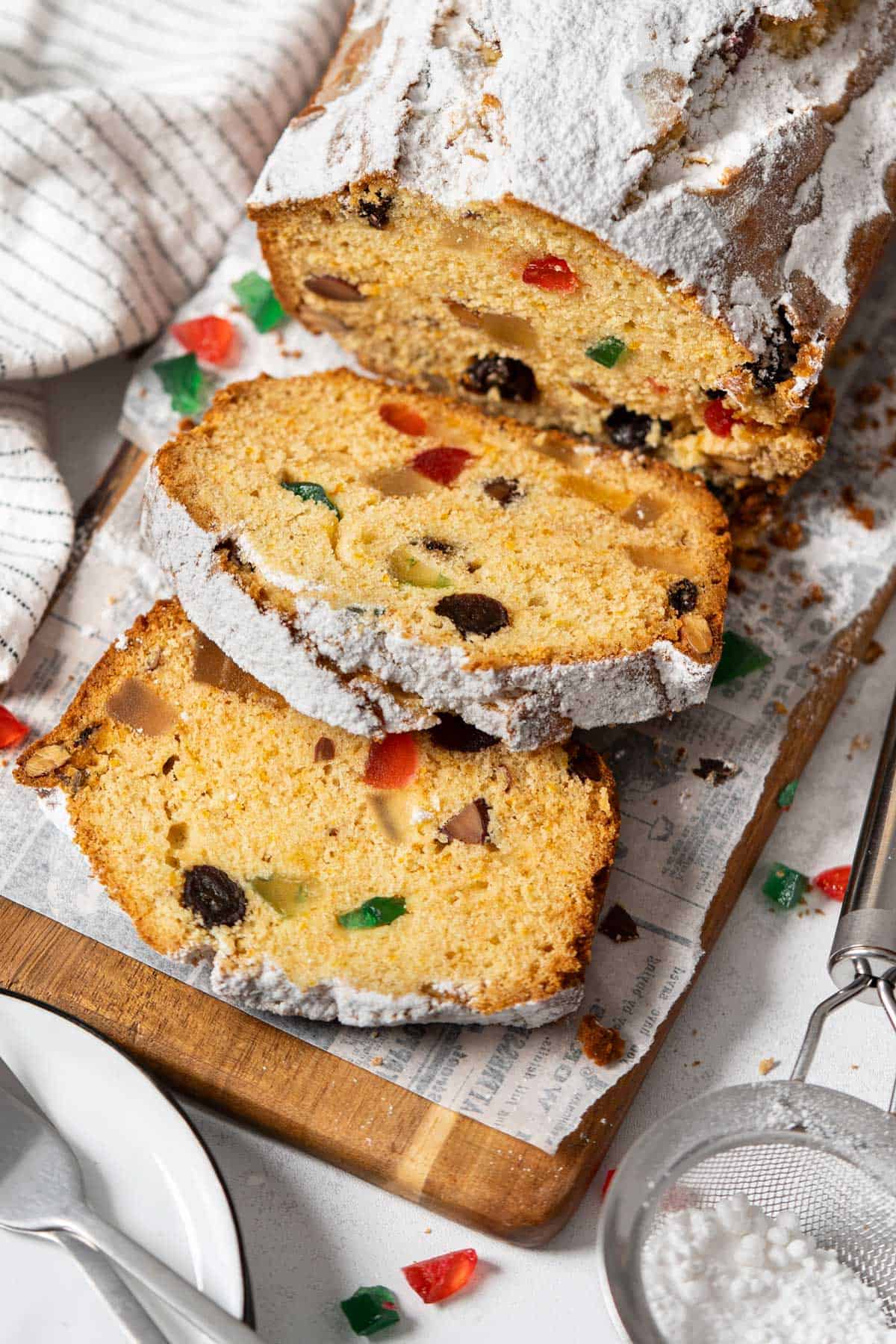 Baked easy fruitcake on a wooden table.
