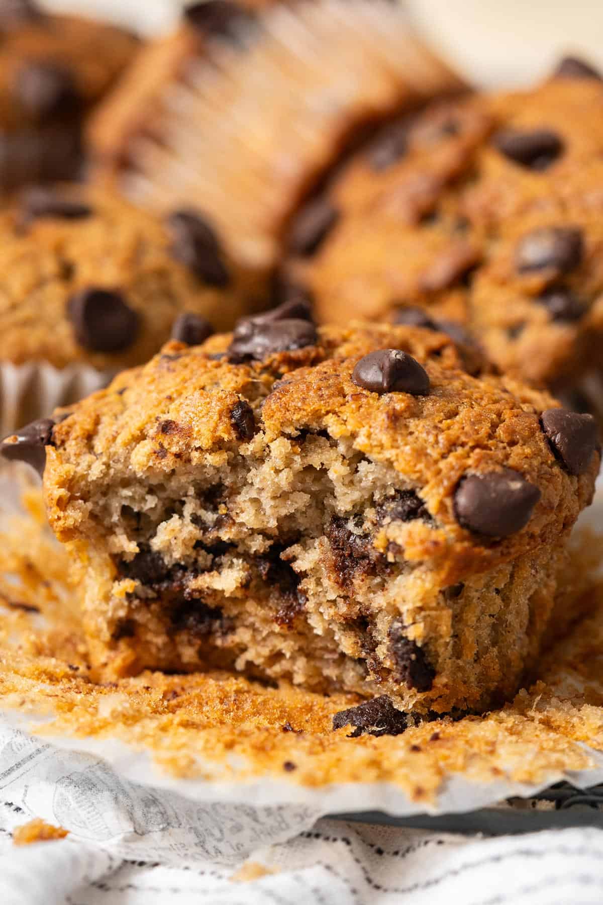 Showing the inside texture of one oat banana muffin.