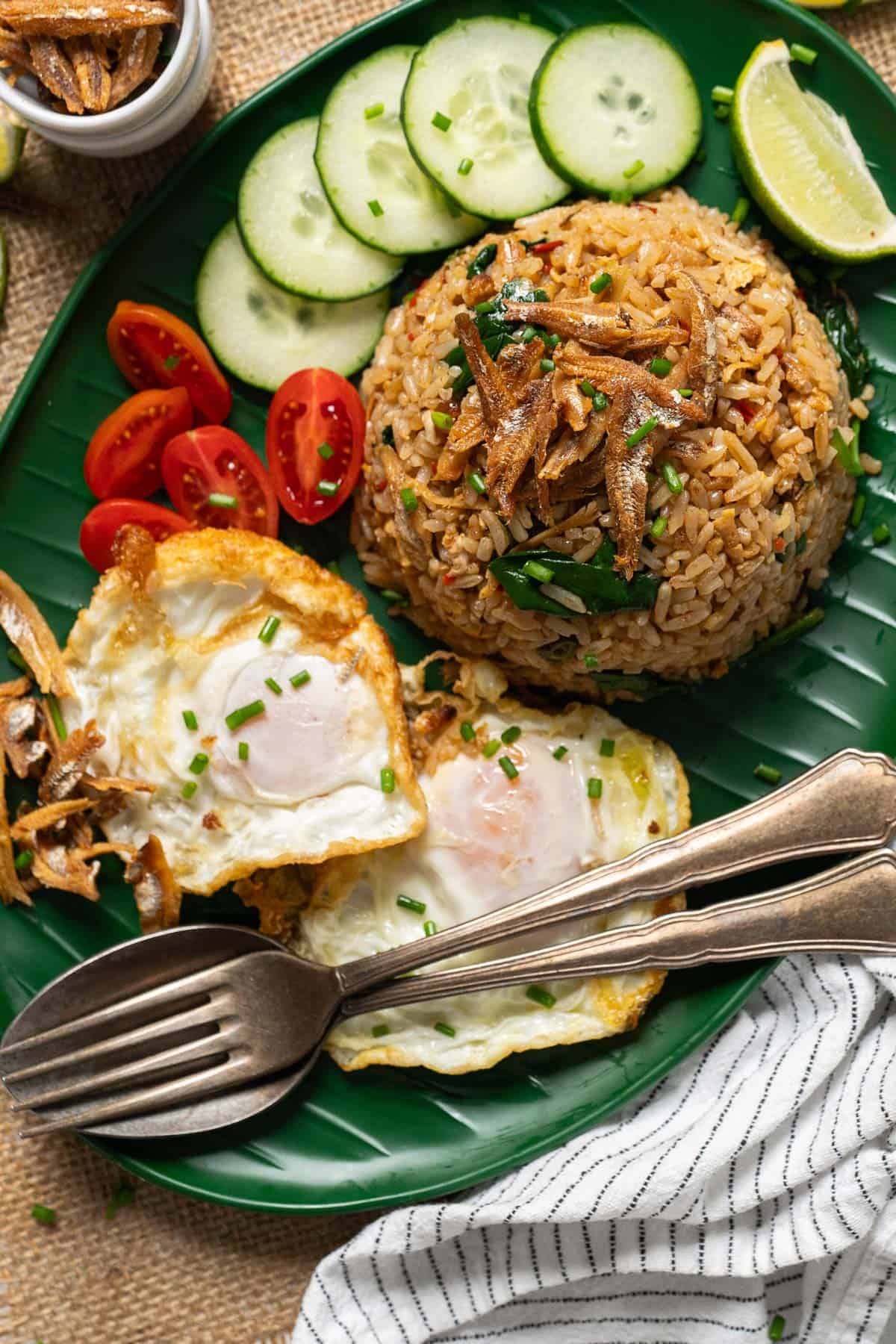 Nasi goreng kampung served with two fried eggs.