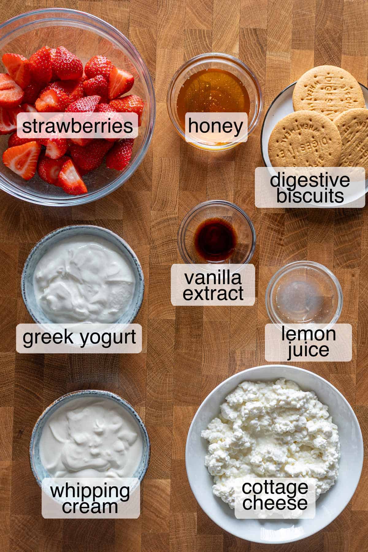 Ingredients to make strawberry cheesecake cups.