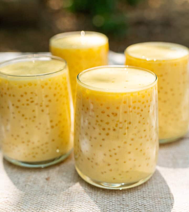 Mango sago pudding in glasses.