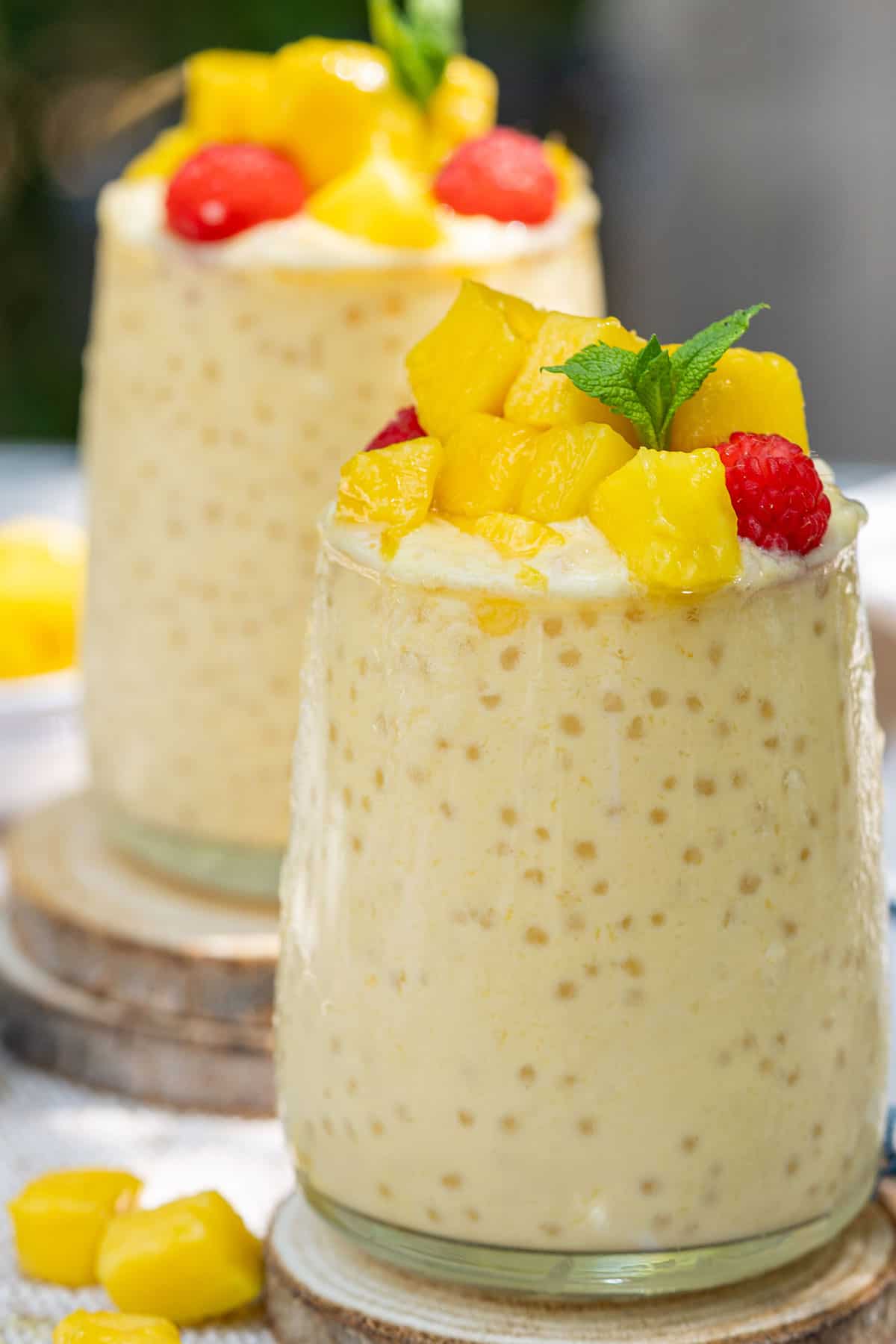 Two glasses of mango coconut sago.