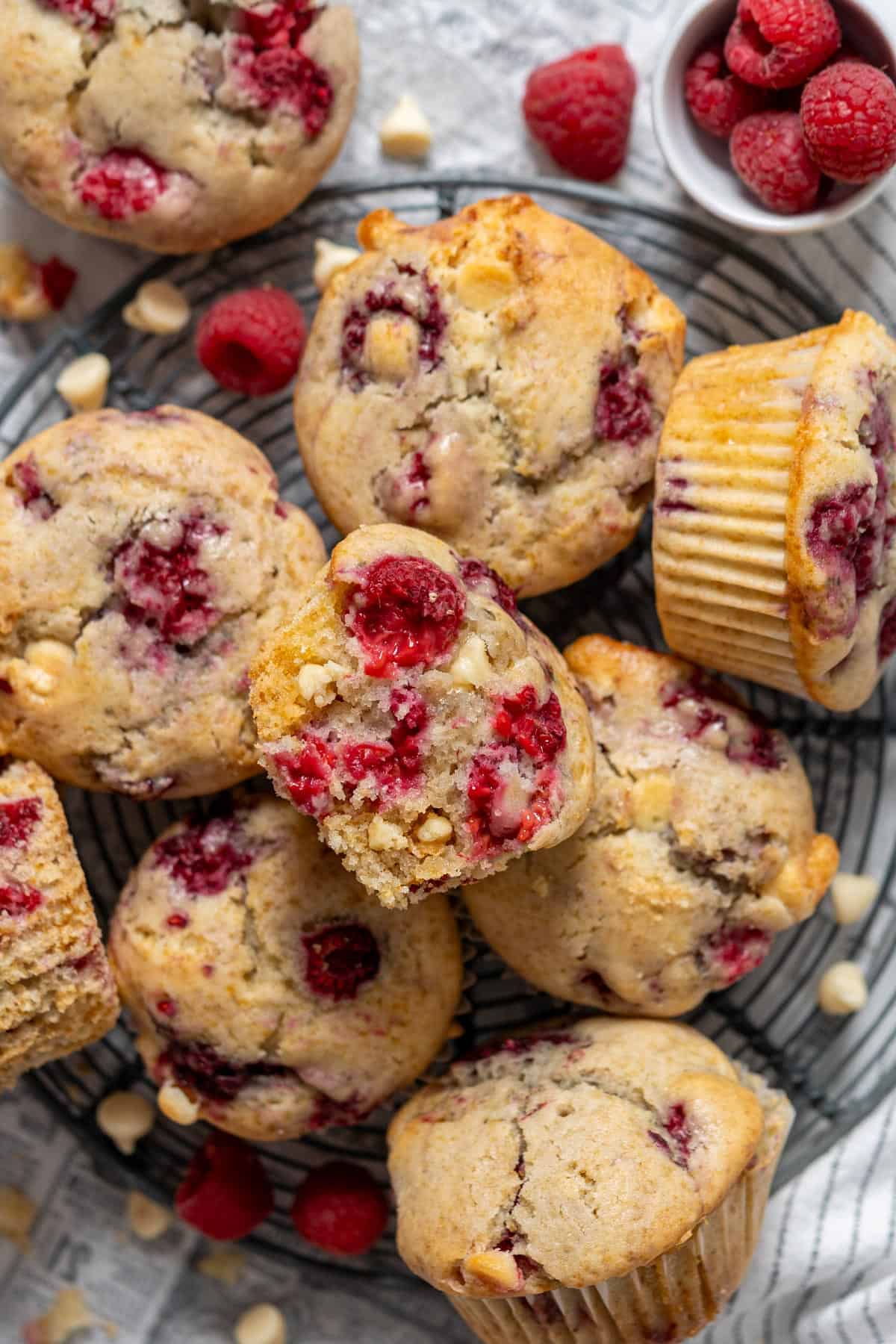 Raspberry white chocolate muffins view from top.