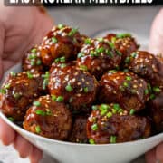 Holding a bowl of Korean meatballs.