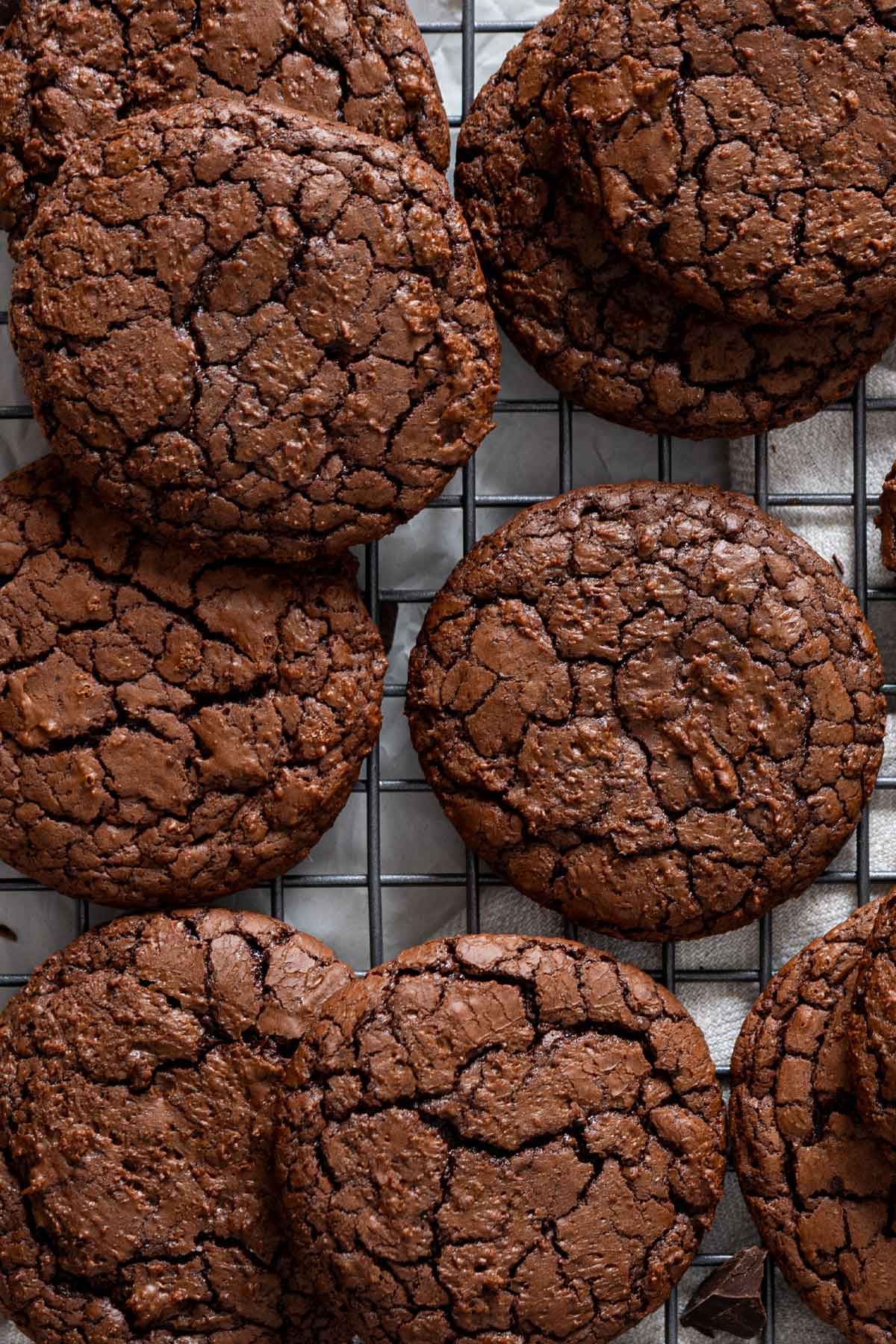 Fudgy brownie cookie on a cooling rack.