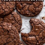 Fudgy brownie cookies on parchment paper.