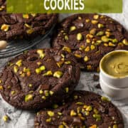 Chocolate pistachio cookies with gooey pistachio cream filling and fudgy brownie-style texture.