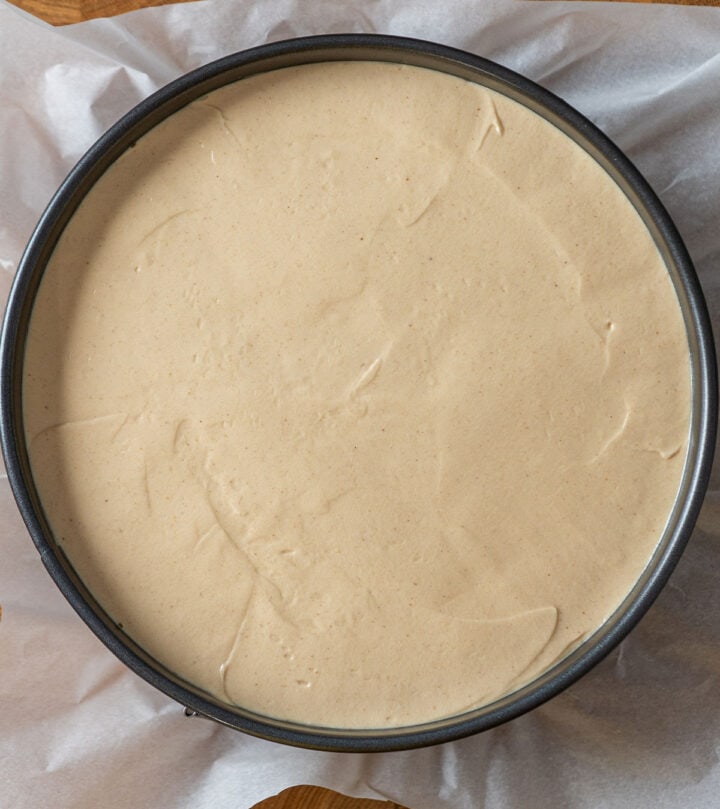 Mixing peanut butter filling with whipped cream for no bake cheesecake.