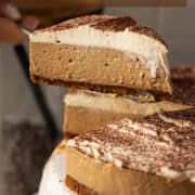 Lifting a slice of no-bake coffee cheesecake without gelatin.