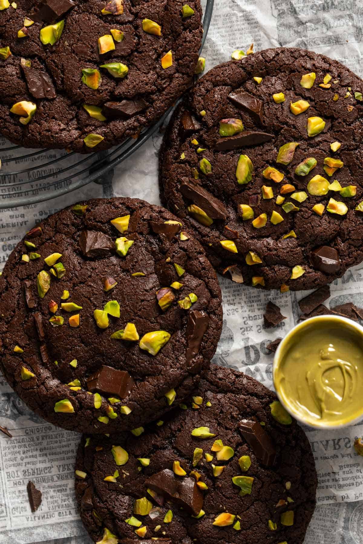 Top view of cookies with a small bowl of pistachio cream.