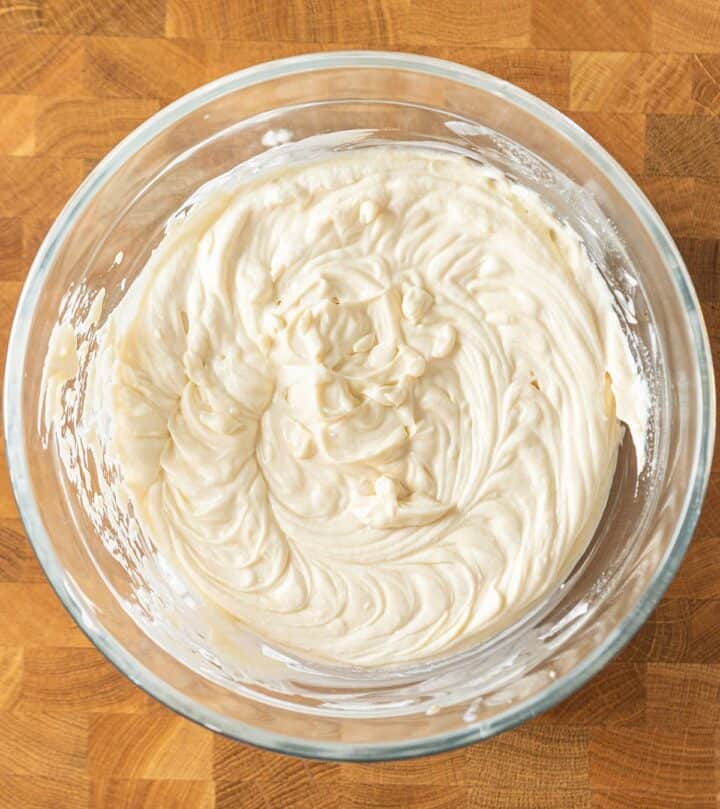 Adding sour cream and other ingredients.