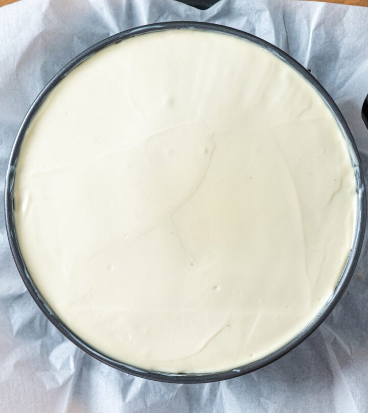 Cheesecake cooling, then chilling overnight for a creamy, crack-free texture.