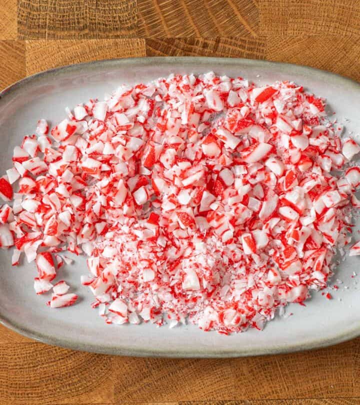 Crushing candy canes into small shards.