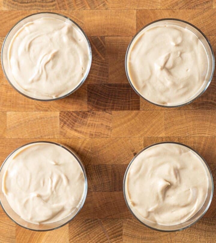 Filling the glasses with Biscoff filling.