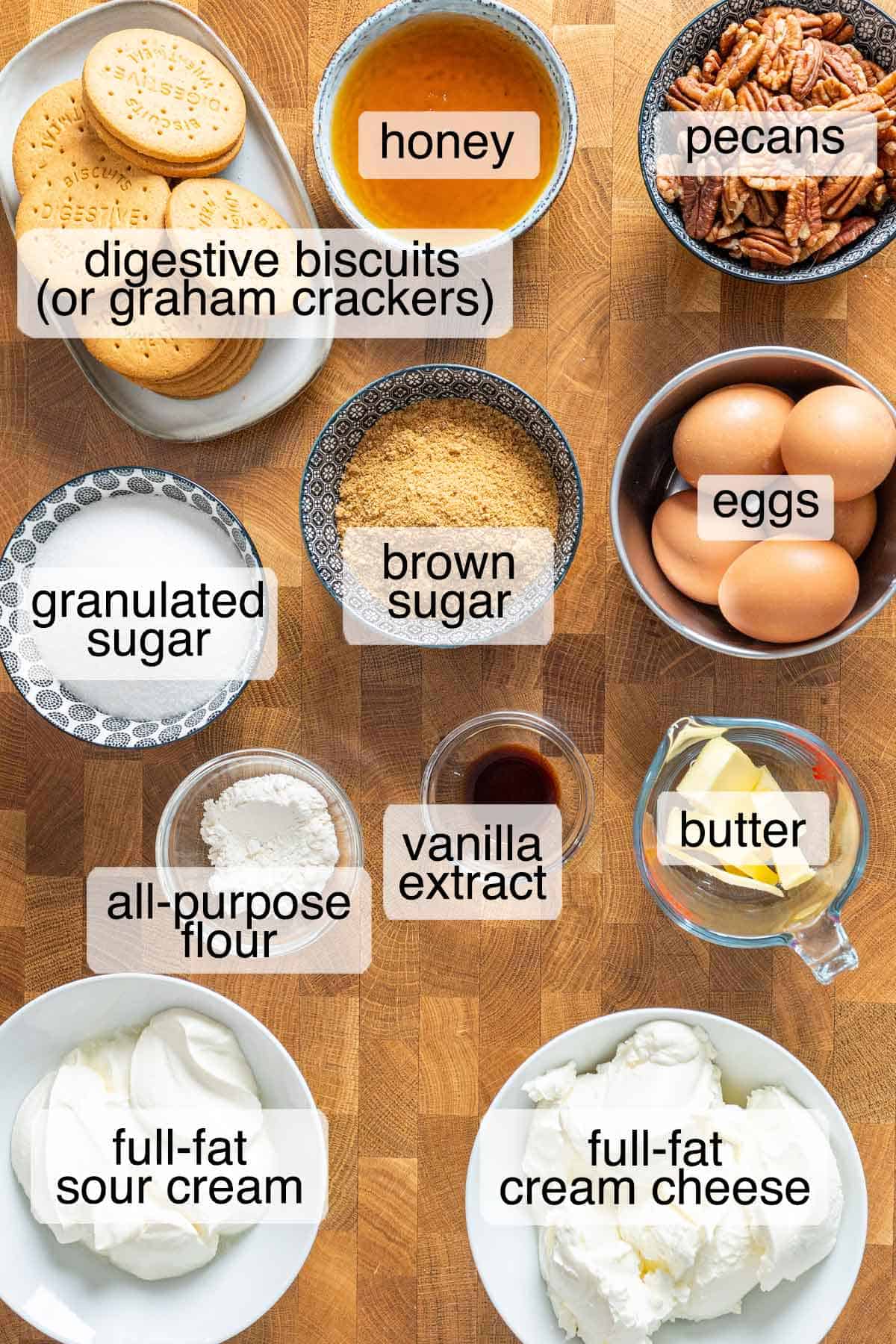 Ingredients to make pecan pie cheesecake bars.