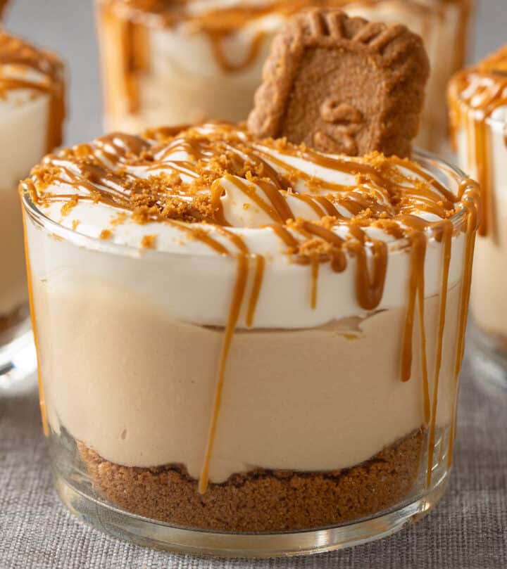 Making the whipped cream topping and decorating the glasses.