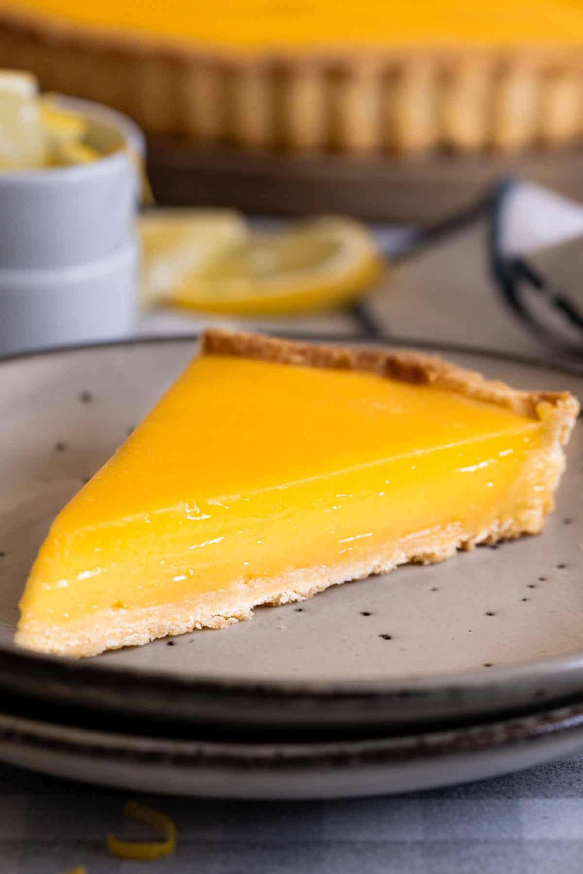 A slice of tart on a plate.