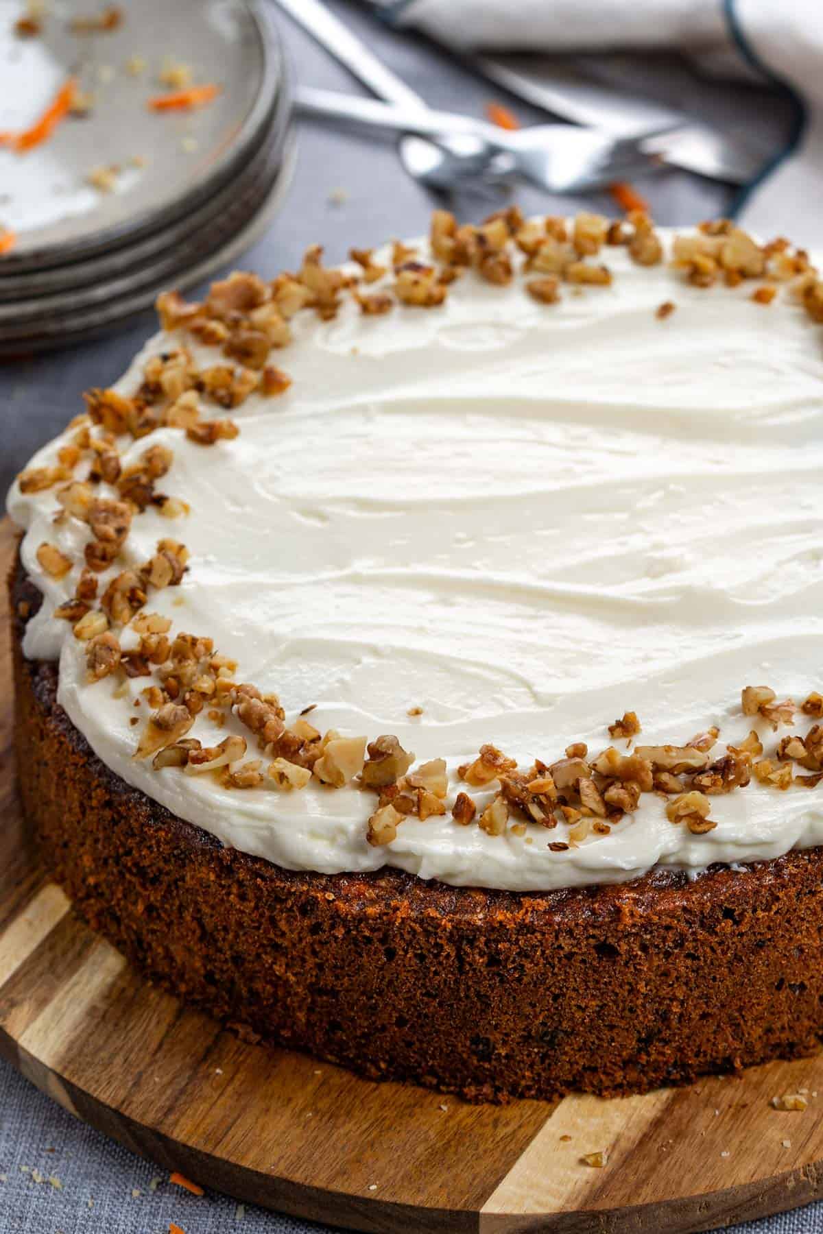 A whole cake on a serving plate.