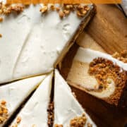 Tender and fluffy carrot cake cheesecake with cream cheese frosting.