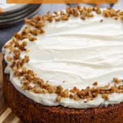Tender and fluffy carrot cake cheesecake with cream cheese frosting.