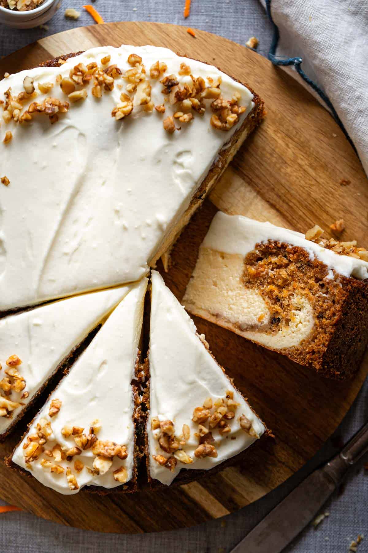Carrot cake cheesecake on a serving plate.
