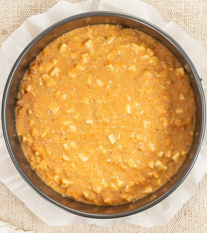 First layer, adding carrot cake batter to springform pan.