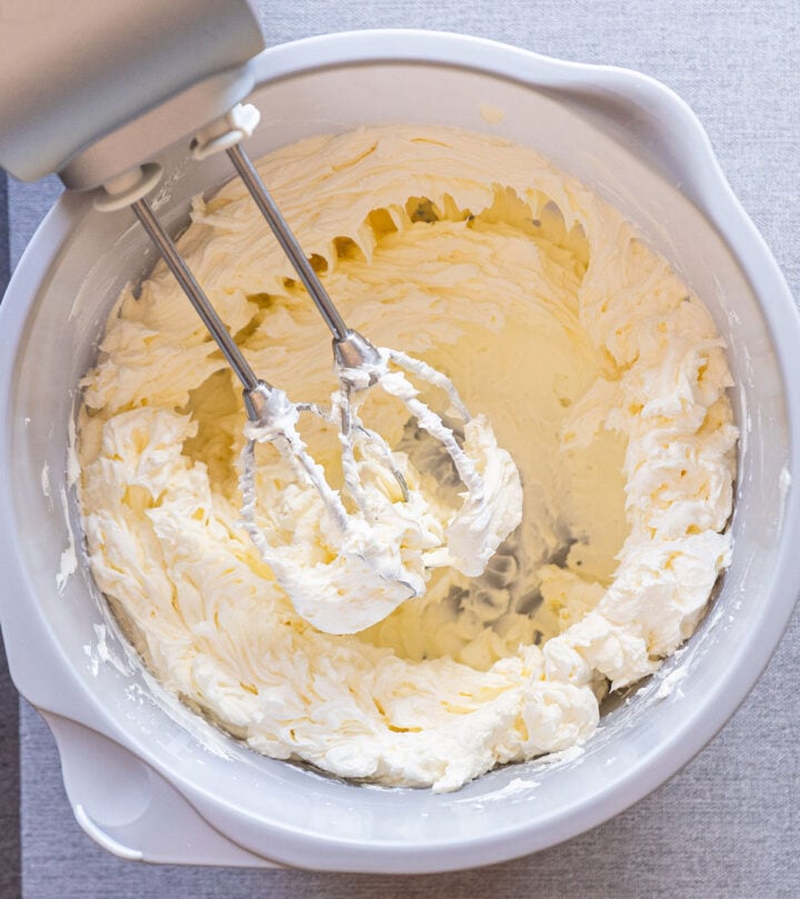Beating cream cheese until creamy.