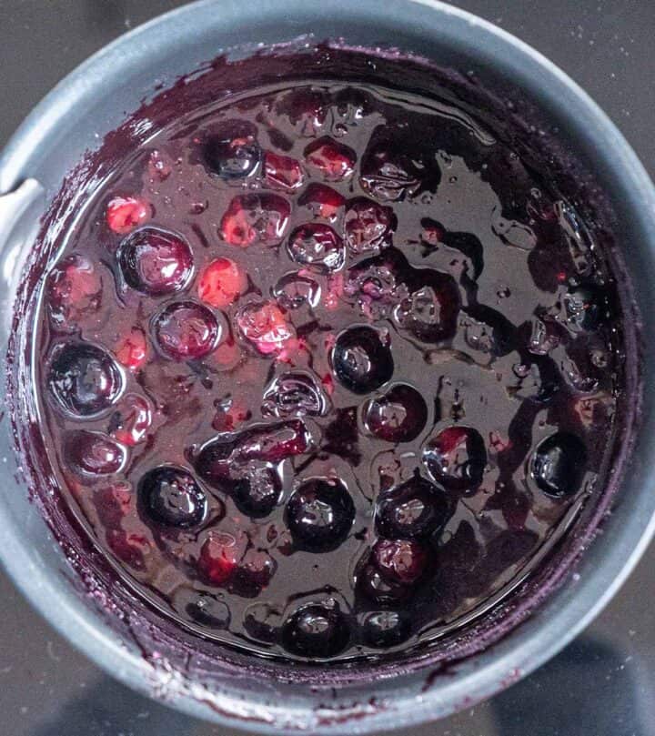 Cooking and cooling the blueberry topping.