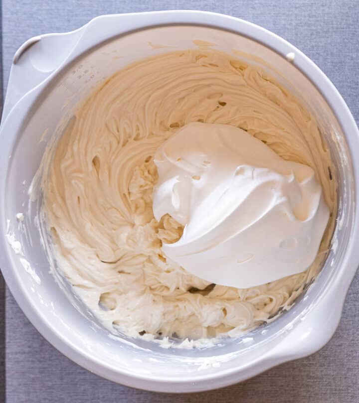 Folding in the heavy cream.