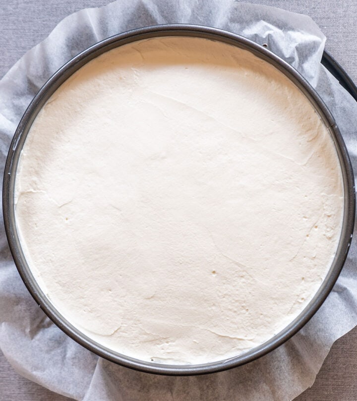 Pouring and smoothing the filling into the pan.