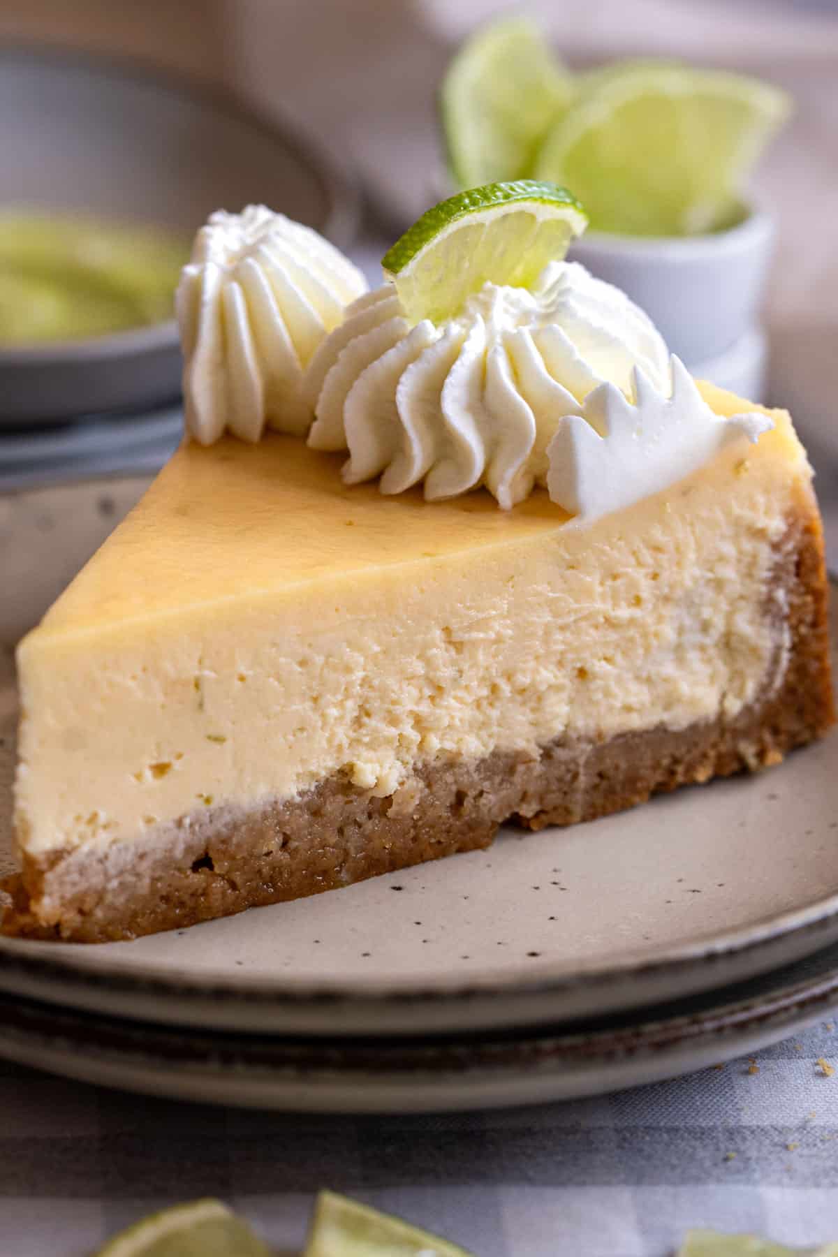 A slice of cheesecake on a plate.