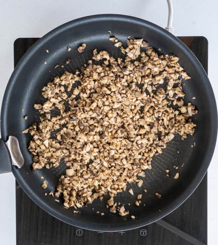 Cooking the mushrooms.