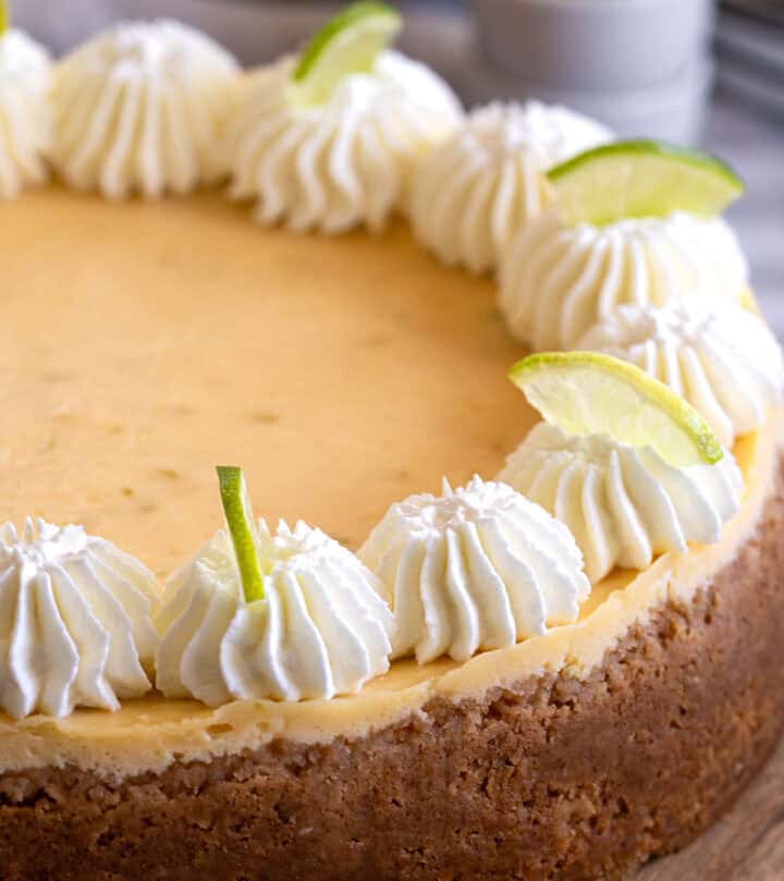 Decorating key lime cheesecake.